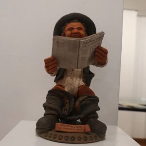 'Zé Povinho Lendo a Gazeta' de Fernando Miguel